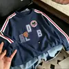 Camiseta de manga larga de algodón puro para niño para primavera y otoño, elegante y fresca, casual y versátil, con tres rayas, camiseta básica estilo coreano