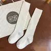 Calcetines largos de rayas verticales blancas, calcetines de algodón para primavera y otoño, calcetines altos, calcetines hasta la rodilla estilo universitario japonés, unisex