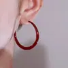 1 par de pendientes clásicos europeos y americanos versátiles de esmalte rojo retro francés, modelo nuevo 2025, exquisitos y de alta gama, estilo nicho