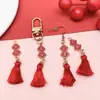 DIY estilo chino Año Nuevo borla doble colgante bendición doble cara joyería accesorios colgante aleación aceite gota colgante venta al por mayor