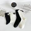 Meias 3/4 com laço traseiro meias femininas primavera e verão novas meias felpudas meias de rede preto e branco explosões ao vivo mulheres