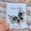 Nueva Moda Elegante Joyería de Cristal Broche de Mariposa Lujo Ligero de Alta Calidad Corsage Atmosférico Accesorios de Pasador Antideslizante