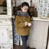 Ropa infantil coreana 2026 otoño e invierno nueva vintage Maillard amarillo jengibre abrigo de lana con capucha de un solo botón para niños y niñas