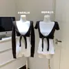 Suéter de punto de manga larga amigable con el viento para mujer, holgado, sin cuello, versátil, de atar, top tipo cárdigan de manga corta, fábrica de origen, spandex