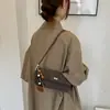 Bolso de axila retro estilo coreano transfronterizo, nuevo bolso baguette de nicho estilo francés, bolso de hombro casual de moda para mujer