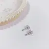 Aretes de Tuerca Geométricos de Estrella de Acero Titanio con Bolas de Acero Grandes y Pequeñas de Moda Simple al por Mayor de Fábrica de Venta Caliente Aretes Perforados Mujeres