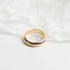 Anillo de Acero de Titanio de Oro de 18 Quilates con Diseño de Nicho Elegante Europeo y Americano Lujo Accesible Anillo de Moda para Mujer Anillo de Dedo Índice