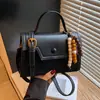 Bolso de Mujer Súper Popular Transfronterizo 2025 Nuevo Bolso Pequeño Popular de Gama Alta de Nicho Portátil para Hombro Cruzado Bolso Cuadrado Pequeño
