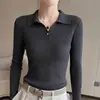 Suéter de punto acanalado estilo francés con cuello polo para mujer, otoño e invierno, con diseño de botones, corte ajustado, versátil, adecuado para el trabajo y como capa base.