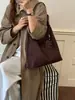 Bolsa tote grande de estilo coreano vintage transfronteiriça para mulheres, bolsa simples mãe e filha outono 2026, bolsa de ombro e axila para o dia a dia