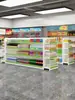 Supermercado, tienda de conveniencia, farmacia, estantería de varios niveles, tienda pequeña, farmacia, supermercado comercial, estante de exhibición de bocadillos