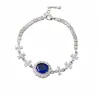 Pulsera geométrica ovalada de flor de circonita, elegante y única, de lujo ligero con un toque de alta gama, joyería de nicho al por mayor