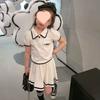 Conjunto de Falda Casual Estilo Coreano para Bebé Niña Niños Grandes Verano Nuevo Estilo Solapa Manga Corta Falda Plisada Conjunto de Dos Piezas