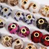Otoño e Invierno felpa suave color punto bola de pelo redonda agujero recto agujero de cordón pendientes accesorios de joyería DIY al por mayor