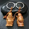 Llavero de Madera de Durazno con Estatua de Buda 3D Finamente Tallada, Colgante para Llaves, Decoración para Atracciones Turísticas y Puestos Callejeros