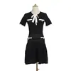 Vestido midi de punto de nuevo estilo veraniego inspirado en Chanel con encaje de color contrastante, mangas cortas caladas, lazo de camelia, falda corta de línea A para mujer
