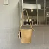 Bolso Cubo Tejido a Mano para Mujer 2026 Nuevo Vintage Lujo Ligero Alto Valor Moda Bolso de Hombro Bolso de Axila Transfronterizo