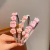 Diadema de tela con diseño de conejito de dibujos animados y flor, con dientes, antideslizante, adecuada para niños, versátil, no daña el cabello, accesorio para el cabello
