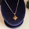 Set de pendientes, collar y anillo de plata chapada en oro real con circonita cúbica, piedra ojo de tigre y forma de flor de diamante - una lujosa y vintage colección de joyería para mujer