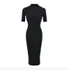Vestido ajustado de punto liso con abertura en la espalda y manga corta para mujer 2026 Verano Nuevo Estilo Americano