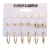 Conjunto de pendientes cruzados nuevo europeo y americano set de 12 piezas pendientes de perlas retro de alta calidad serie simple europea y americana de tres colores