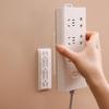 Plug-in cabo porta-placa suporte sem estanque linha plugue de armazenamento parede tomada parede pendurado plug-in roteador placa Titular