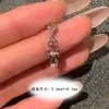 Colgante de Diseño Único Lazo Tenedor Hueso de Oreja Uña Acero de Titanio Hilo Sin Dormir Corazón Roscado Circonita