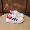 Zapatos infantiles de suela blanda, nuevas zapatillas blancas para primavera y otoño con velcro, zapatillas deportivas casuales para niños y niñas, zapatos ligeros y antideslizantes