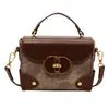 Bolsa pequena popular feminina da moda deste ano, combina com tudo, 2023 nova bolsa mensageiro de ombro vintage, caixa portátil, bolsa pequena quadrada