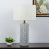 Lámpara de mesa de cerámica con diseño de peces estilo americano simple para sala de estar, mesita de noche de dormitorio, estudio, lámpara para habitación modelo de hotel, estilo de diseñador