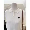 Suéter de punto trenzado para mujer con cuello polo estilo universitario, de manga corta, adelgazante y único, de longitud corta, nuevo top de moda para el verano de 2025