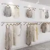 Arara de exposição de roupas montada na parede cabide de vestiário Barra de aço inoxidável arara de exposição de loja de roupas montada na parede Cabide de parede