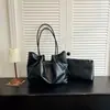 Bolsa tote com alça estilo vintage para mulheres, outono e inverno de 2026, bolsa de ombro de couro PU de grande capacidade, bolsa de mão fashion