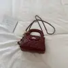 Bolso de mano con cadena de patrón de diamante estilo coreano Shuai Mijia para mujer, nuevo y elegante bolso de hombro y cruzado de moda retro 2026