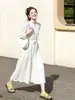 Vestido blanco de cuello francés para mujer, nuevo de verano 2026, casual, entallado en la cintura, adelgazante, versátil, largo, con un aire elegante