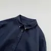 Camisa de lino azul marino para mujer, diseñador de nicho, versátil y de alta calidad, con detalles bordados en el cuello
