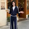 Conjunto de dos piezas para mujer: chaqueta a rayas con capucha y cremallera de estilo deportivo casual + pantalones largos anchos con cordón