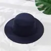 Otoño e invierno Nuevo sombrero británico para hombre sombrero de lana de copa plana estilo europeo y americano sombrero de jazz con ala sombrero para mujer venta al por mayor