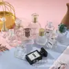 Botellas de Perfume de Vidrio Transparente en Stock al por Mayor, Botellas de Muestra de Vidrio Portátiles, Botellas con Atomizador de Presión, Botellas Vacías Recargables para Perfume
