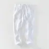 8236 verano nuevo lino puro transpirable pantalones de cordón para hombre color liso simples casuales pantalones para hombre una generación de pelo