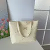 Bolsa de Verão Feminina Nova Casual com Estampa de Estrelas de Grande Capacidade Moda Tendência Fresca de Ombro Único Sob o Braço