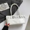 Bolso de hombro versátil de gran capacidad 2026 moda para mujer de trabajo bolso de axila otoño e invierno retro simple transfronterizo nuevo modelo