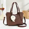 Bolso Pequeño de Alta Gama y Estilo para Mujer 2025 Nuevo Invierno Versátil Bolso Cruzado de Moda Súper Popular Bolso de Mano Bolso Cubo