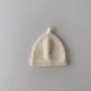 Gorro de lana cálido para bebé estilo coreano ins color liso otoño e invierno para niños y niñas simple versátil gorro para el frío
