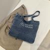 Bolso de lona vaquera estilo americano vintage, bolso de hombro bordado de gran capacidad, bolso de mano para estudiantes, bolso de viaje para todo tipo de ocasiones.