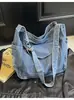 2026 Bolsa Grande de Jeans Feminina Nova Estilosa para o Trabalho Bolsa Tote Grande Bolsa Tote para Passeio Bolsa de Ombro Versátil