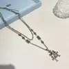 Colar Pingente Cruz Camada Dupla Punk Hip Hop Retrô Trinta Caracteres Feminino Nicho Menina Apimentada Corrente de Suéter Personalidade de Alto Padrão Tendência