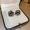 Pendientes de flor negra Aguja de Plata retro francés alto sentido nicho versátil temperamento pendientes Yiwu joyería al por mayor