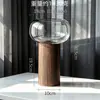 Vaso de vidro com base redonda de madeira, vaso decorativo de flores minimalista de alta qualidade, arranjo de flores estilo ins com senso de elegância