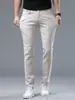2026 Novo Jeans Bege Champagne Moda Business Tendência Casual Versátil Slim Corte Reto